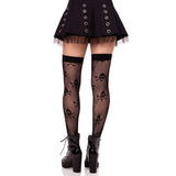 Collants à pois avec tête de mort