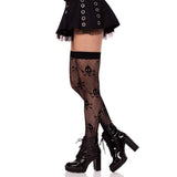 Collants à pois avec tête de mort