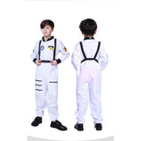 Junior Space Explorer Costume -  Child astronaut. Front and back view of a child wearing a white astronaut jumpsuit costume with space patches and a black harness